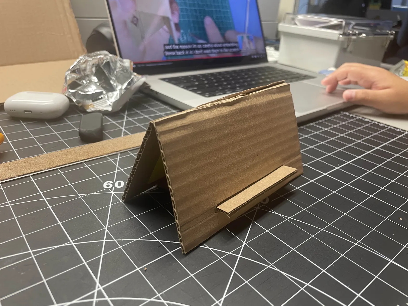 The phone stand we built following Maker Brain's tutorial on YouTube: https://www.youtube.com/watch?v=3LgJ7QjEKZs